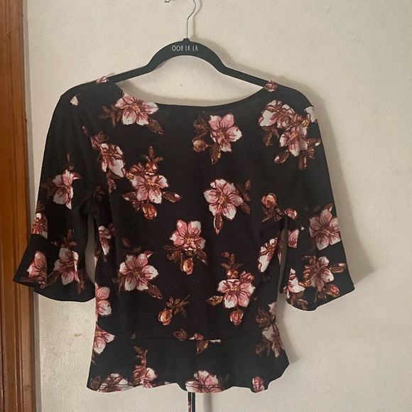 Almost famous pink floral cropped flared peplum top with string tie bottom - Picture 2 of 2